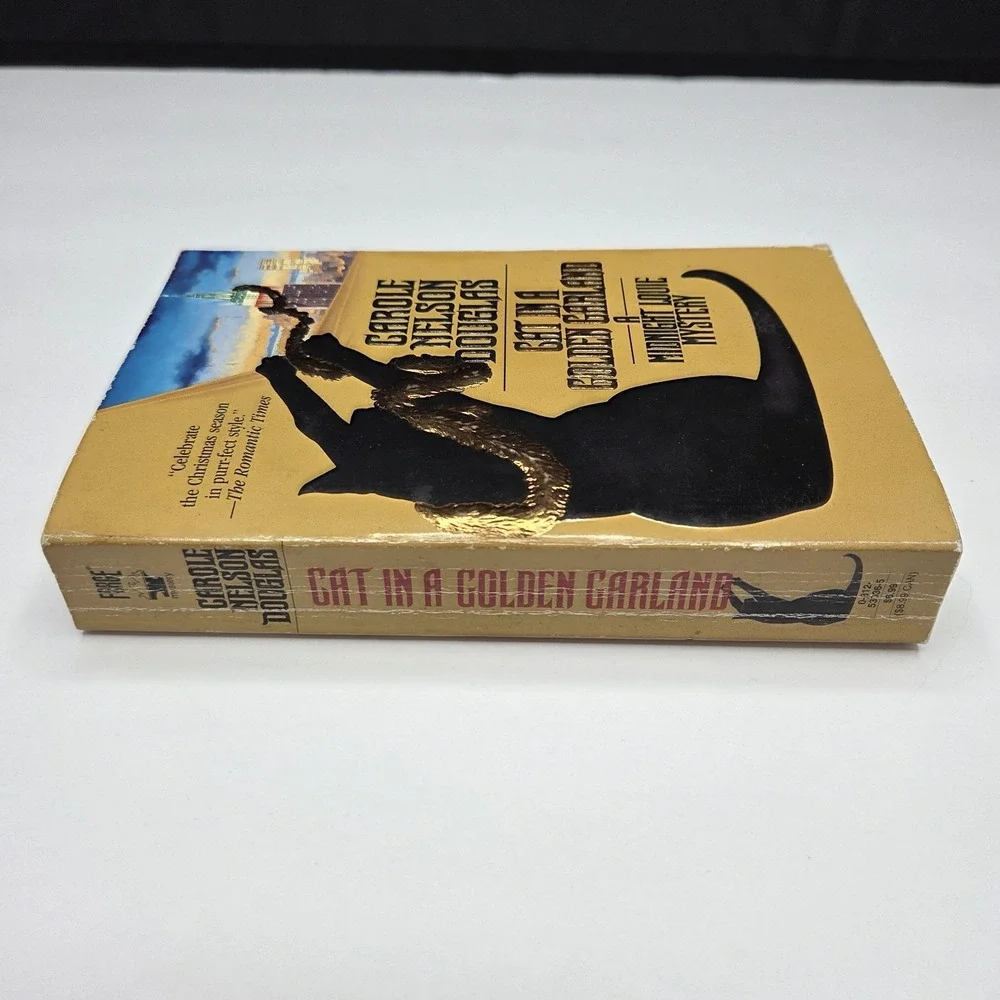 Cat in a Golden Garland by Carole Nelson Douglas Midnight Louie Mystery